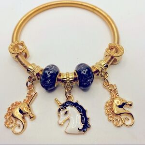 Bracelet golden Unicorns and lucky horse shoes!